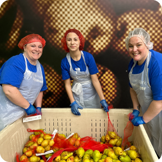 Rivermark employees volunteering at the Oregon Food Bank.