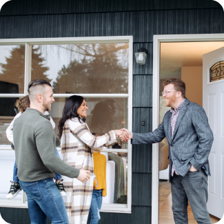 Couple meeting with a realtor to look at a house their might want to buy.