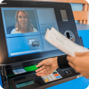 Person using a video teller machine.