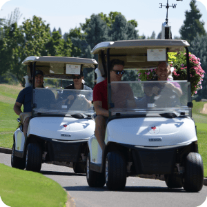 People driving golf carts.