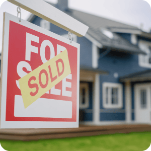 Sold sign in front of a home.