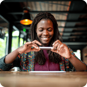 Woman using mobile deposit on her phone.