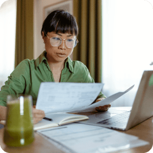 Woman looking through documents.