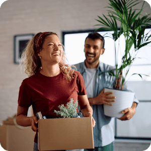 Young couple moving into a new home.