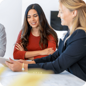 Woman talking to a mortgage loan officer.