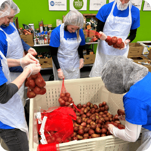 Rivermark staff volunteering at the Oregon Food Bank.