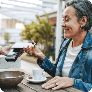 Person paying with mobile wallet on their phone.