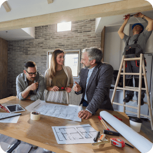 Couple talking through renovations with their project manager.