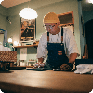 Man working at a desk.