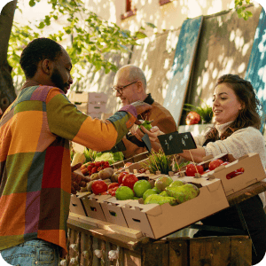 Man shopping at a farmers market.