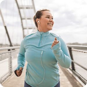 Happy woman going for a jog.